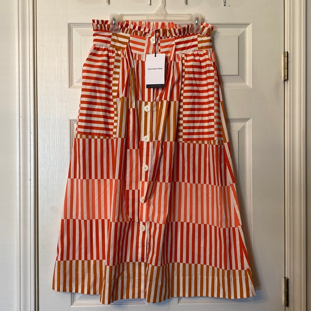 Adorable orange and white skirt. Target size M